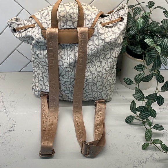 Calvin Klein Monogrammed White and Tan Backpack